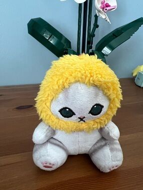 Plush Toy with Yellow Fuzzy Hood and Big Green Eyes